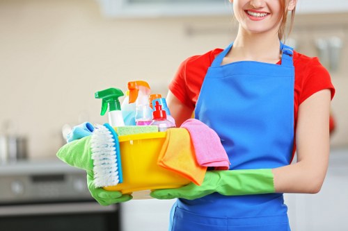 Carpet cleaning technician preparing professional cleaning equipment