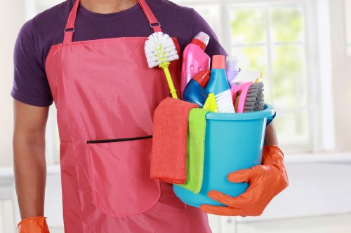 Carpet cleaning team in E1 using eco-friendly recycling practices