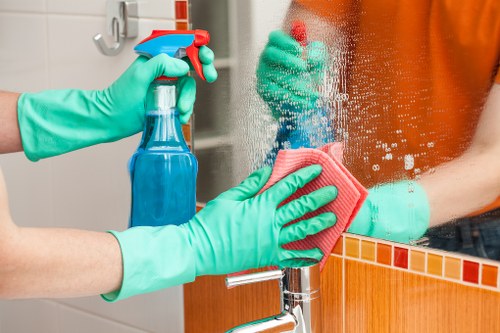 Local E1 cleaning team preparing for a scheduled recurring visit