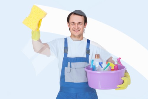 Local cleaning team handling renovation dust in a converted E1 property