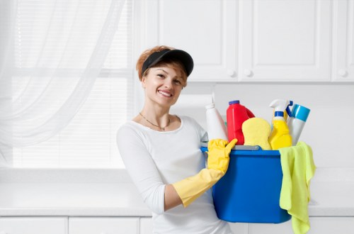 Airbnb cleaning service preparing a short-let flat in E1